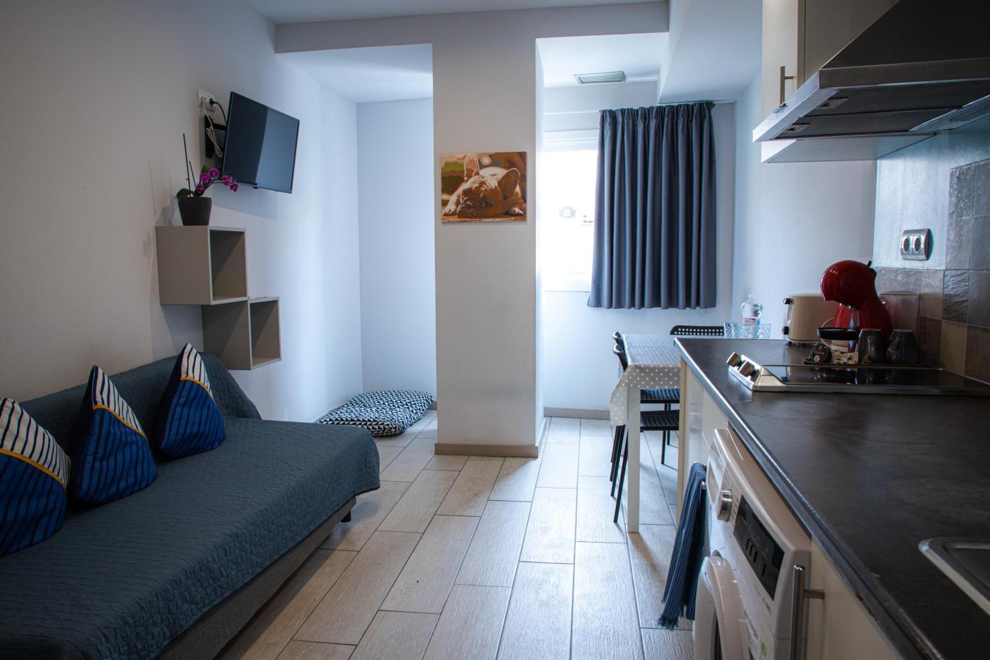 Apartamentos Comfort Calella Bagian luar foto