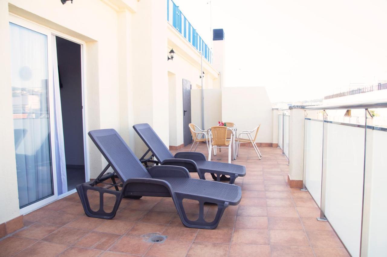 Apartamentos Comfort Calella Bagian luar foto